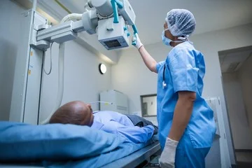 Radiologist reviewing X-Ray scans